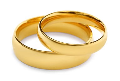 Photo of Beautiful golden wedding rings isolated on white