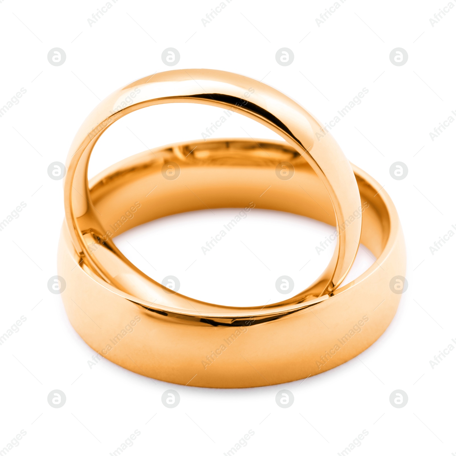 Photo of Beautiful golden wedding rings isolated on white