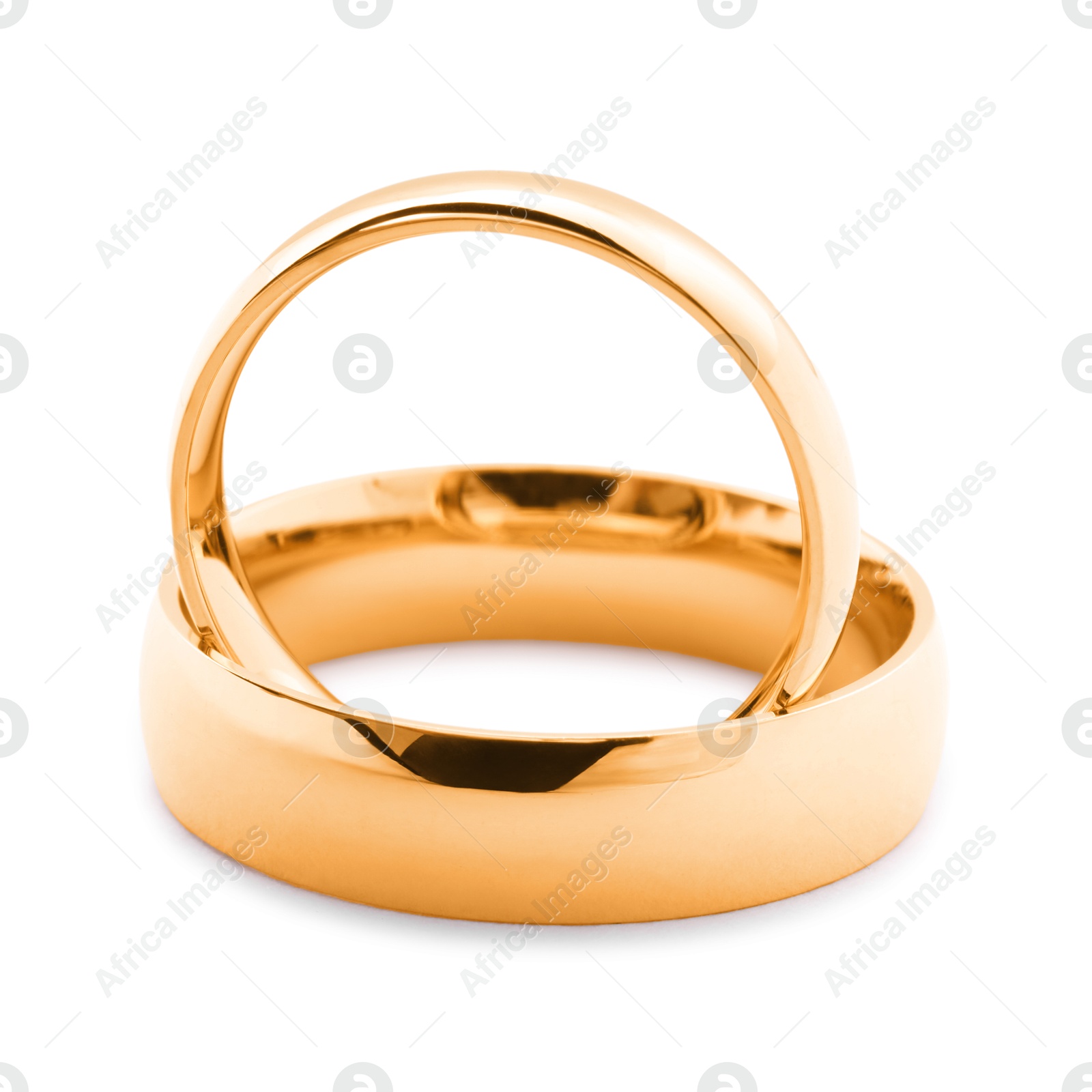 Photo of Beautiful golden wedding rings isolated on white