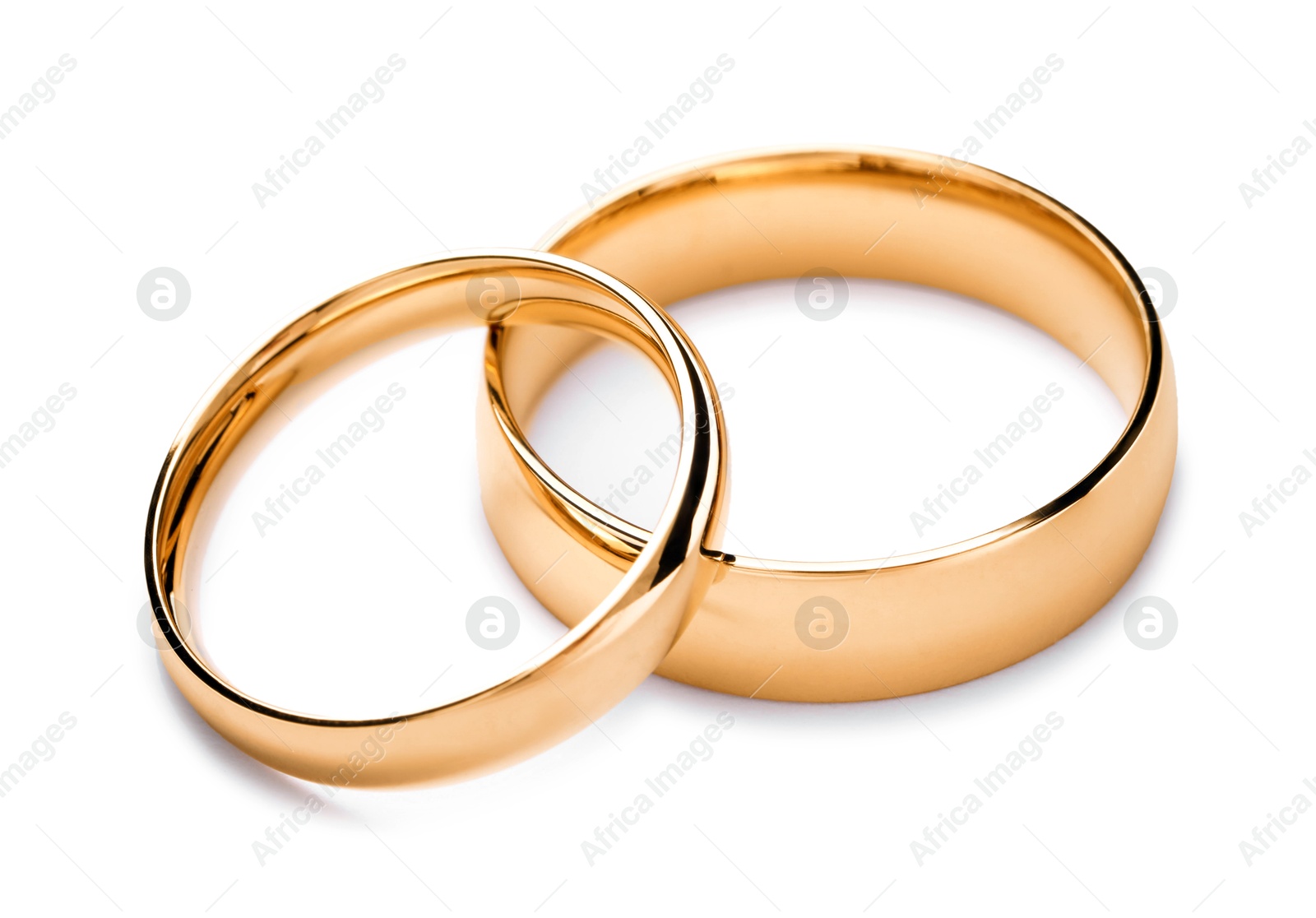 Photo of Beautiful golden wedding rings isolated on white