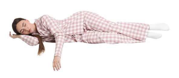 Young woman suffering from sleepwalking on chair against white background