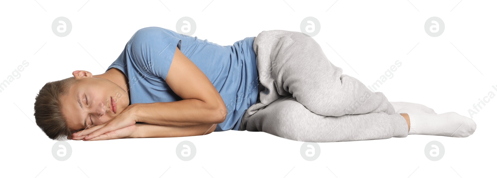 Photo of Handsome young man sleeping against white background