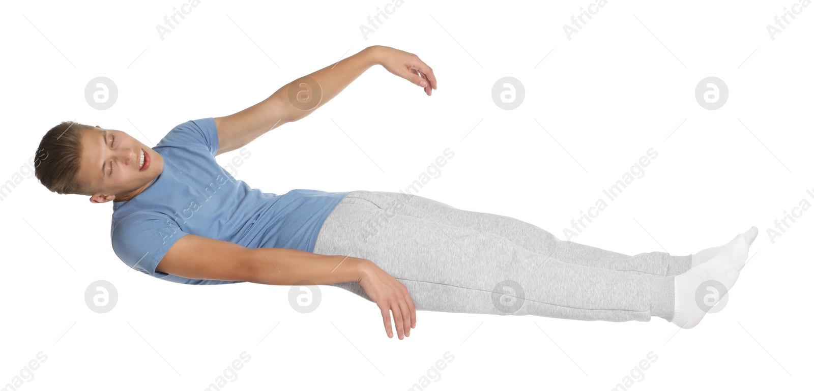 Photo of Young man suffering from sleepwalking on white background