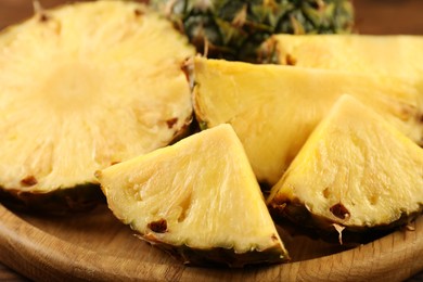 Cut fresh ripe pineapple on table, closeup