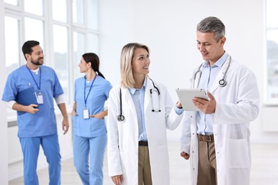 Photo of Healthcare workers in hospital, selective focus. Medical service