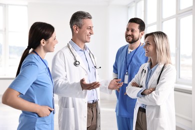 Photo of Team of healthcare workers in hospital. Medical service