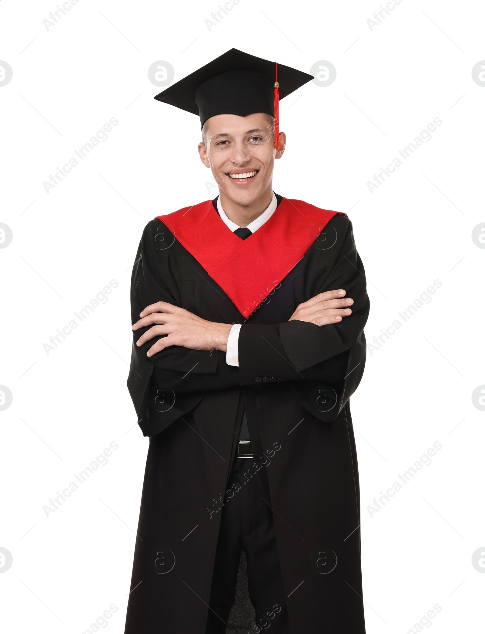 Photo of Happy student with crossed arms after graduation on white background