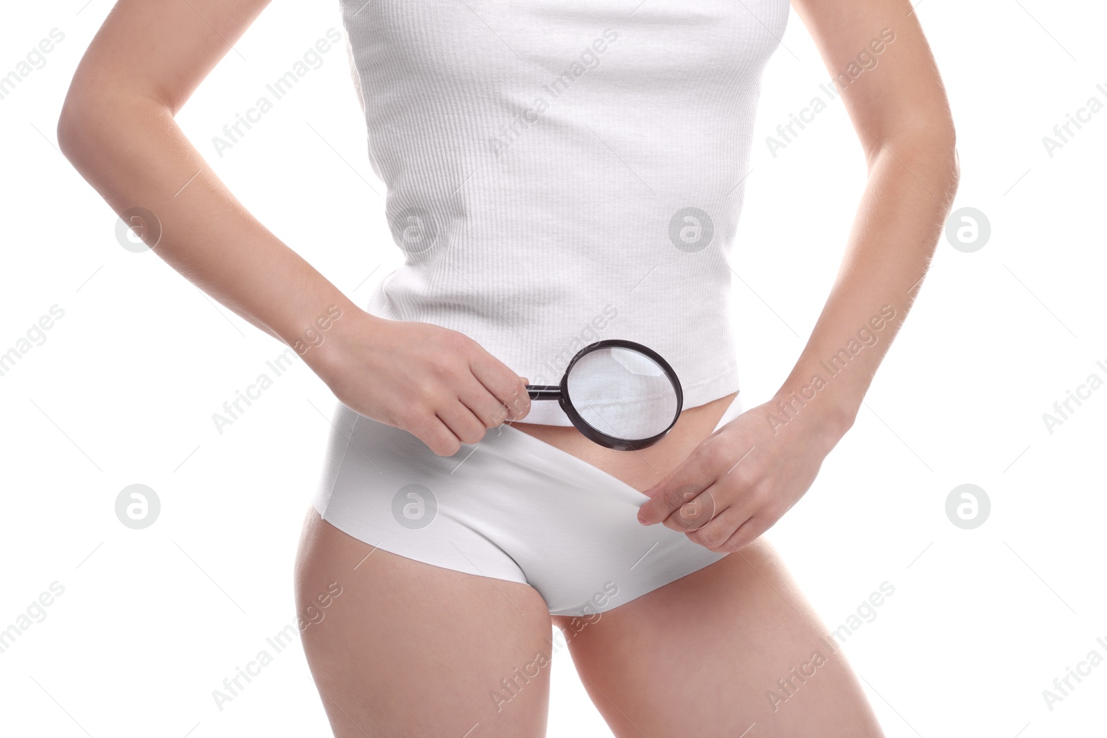 Photo of STD (sexually transmitted disease). Woman examining genital area with magnifying glass on white background, closeup