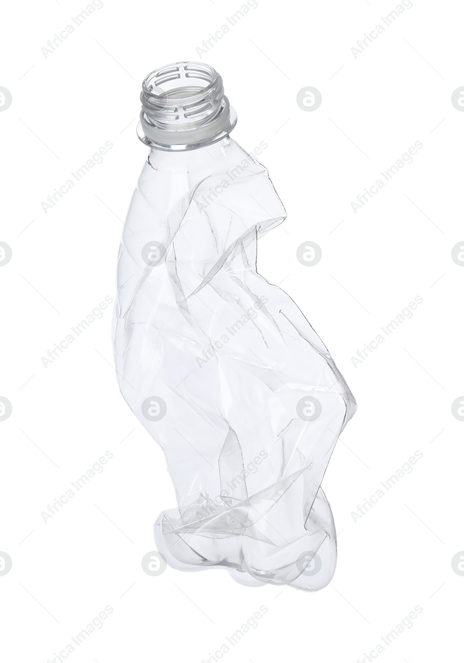 Photo of One crumpled plastic bottle isolated on white