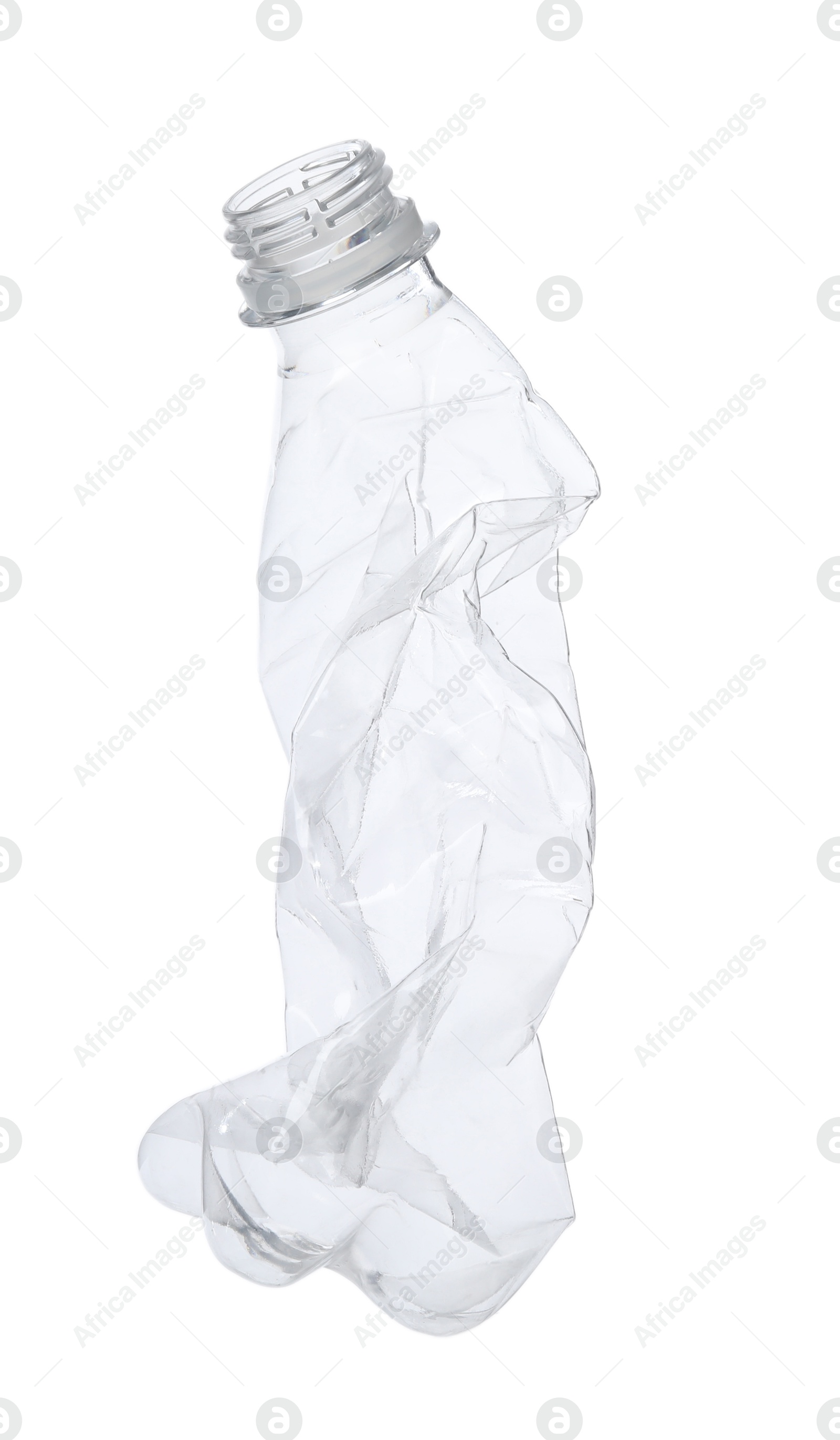 Photo of One crumpled plastic bottle isolated on white