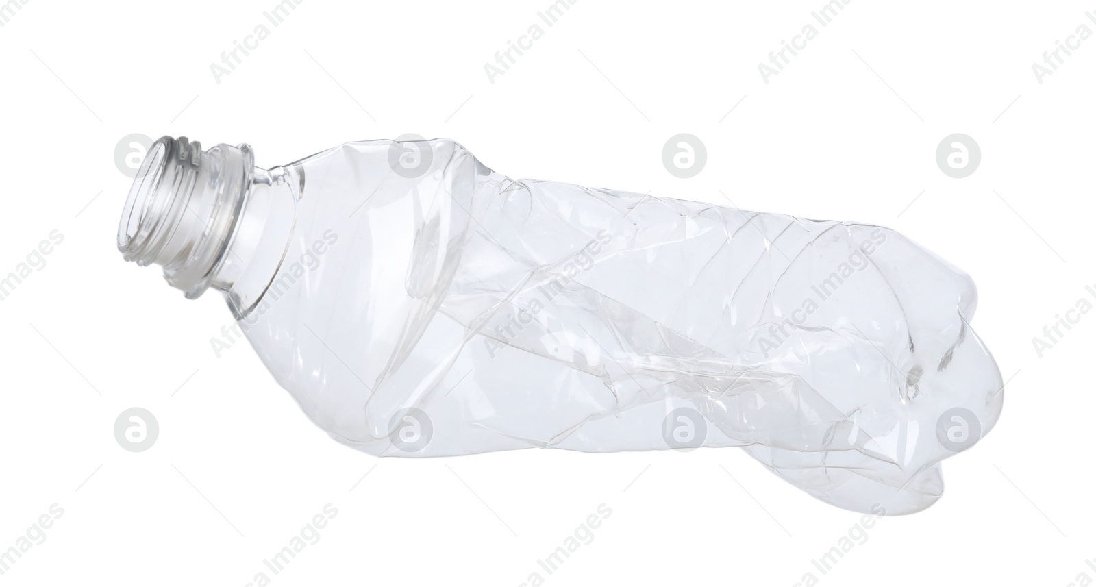 Photo of One crumpled plastic bottle isolated on white