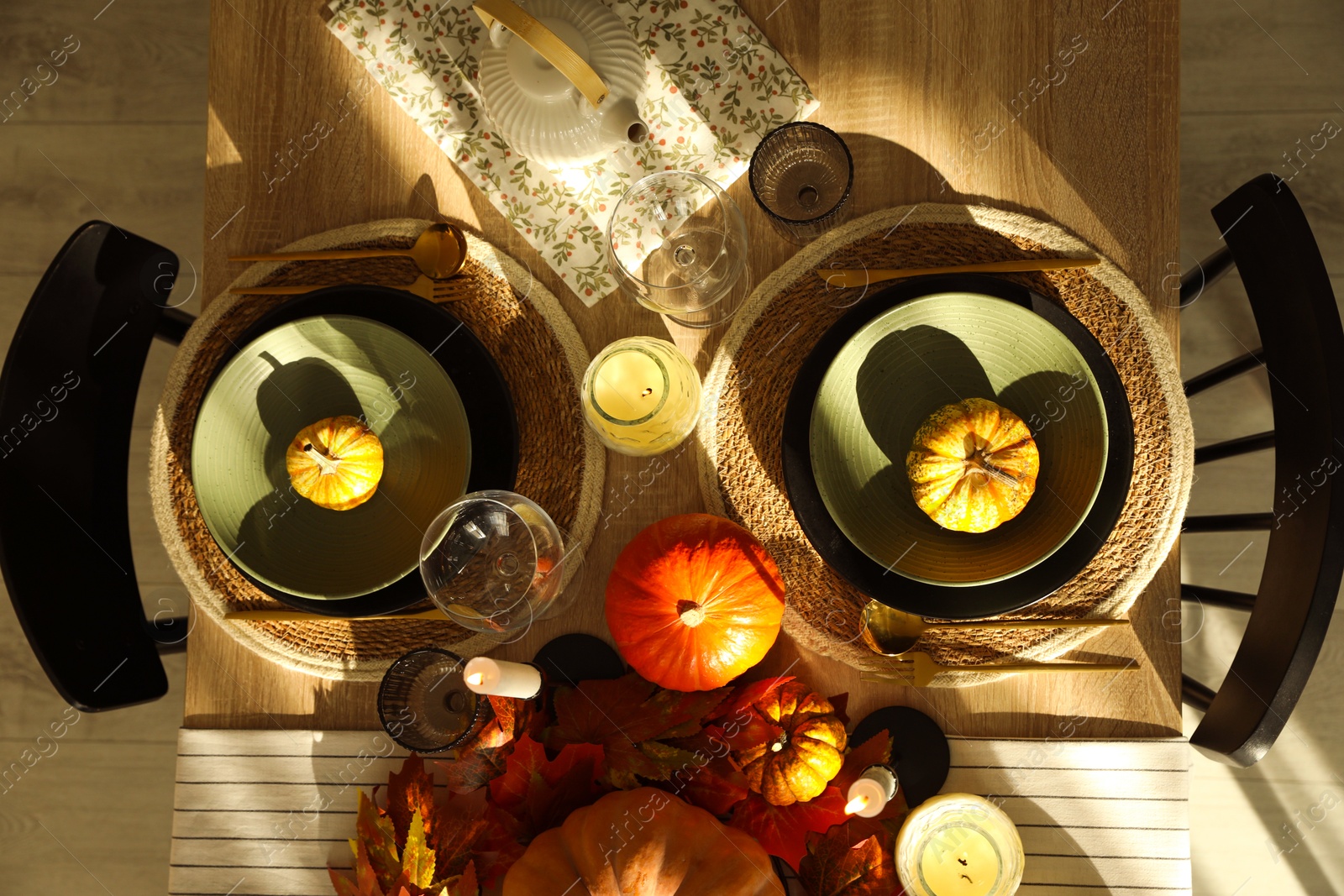 Photo of Stylish table setting with beautiful autumn decor in dining room, top view