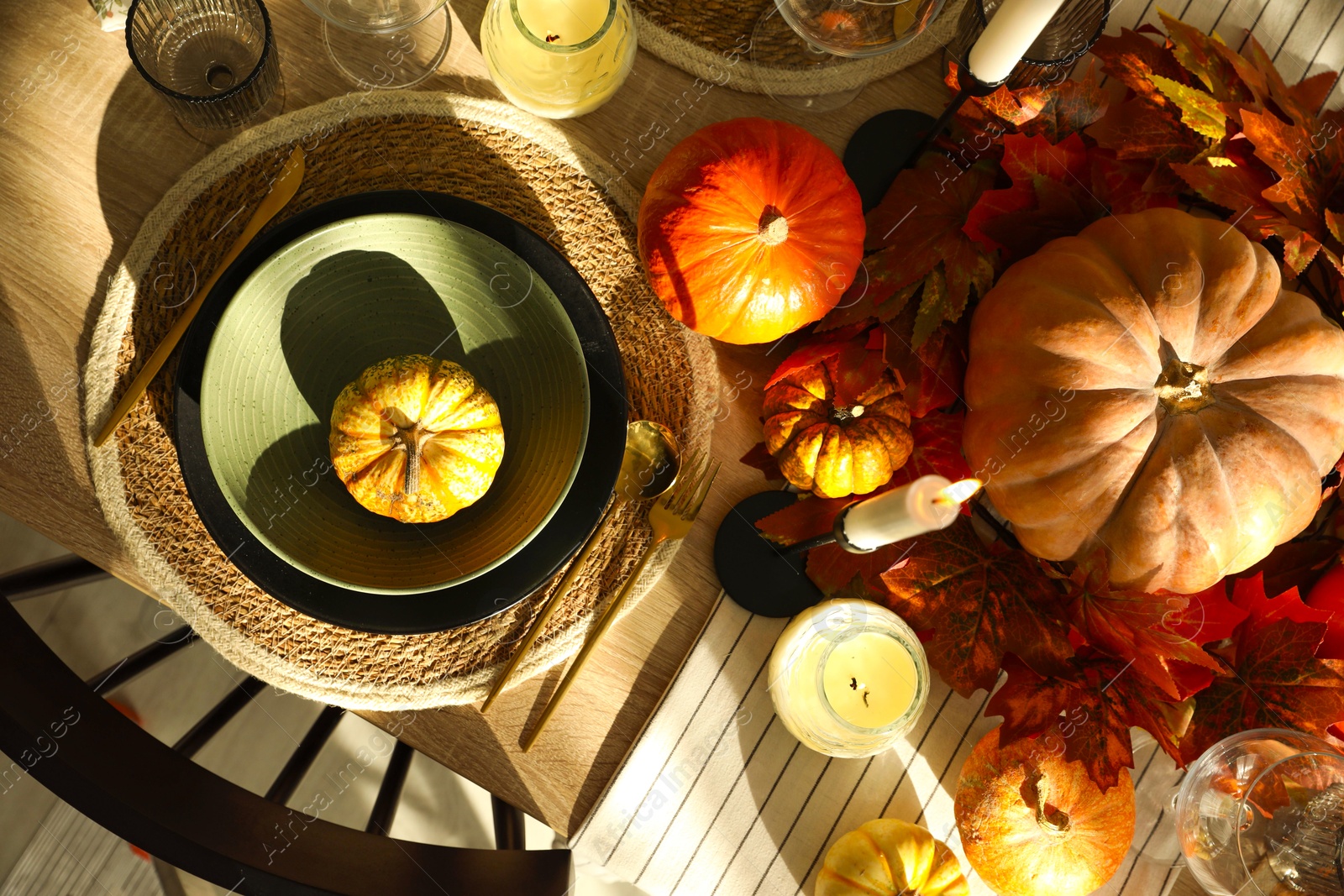 Photo of Stylish table setting with beautiful autumn decor in dining room, top view