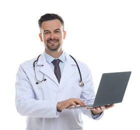 Photo of Smiling doctor with stethoscope using laptop on white background