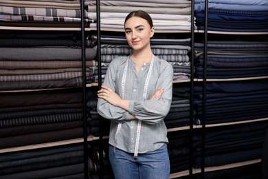 Photo of Atelier. Young woman working in professional workshop