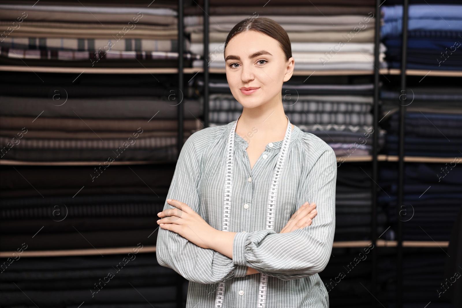 Photo of Atelier. Young woman working in professional workshop