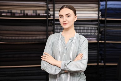 Photo of Atelier. Young woman working in professional workshop