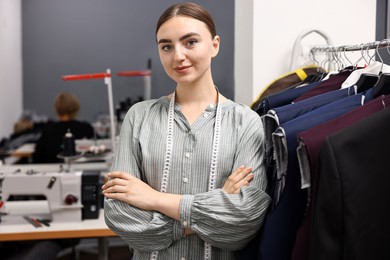 Photo of Atelier. Young woman working in professional workshop