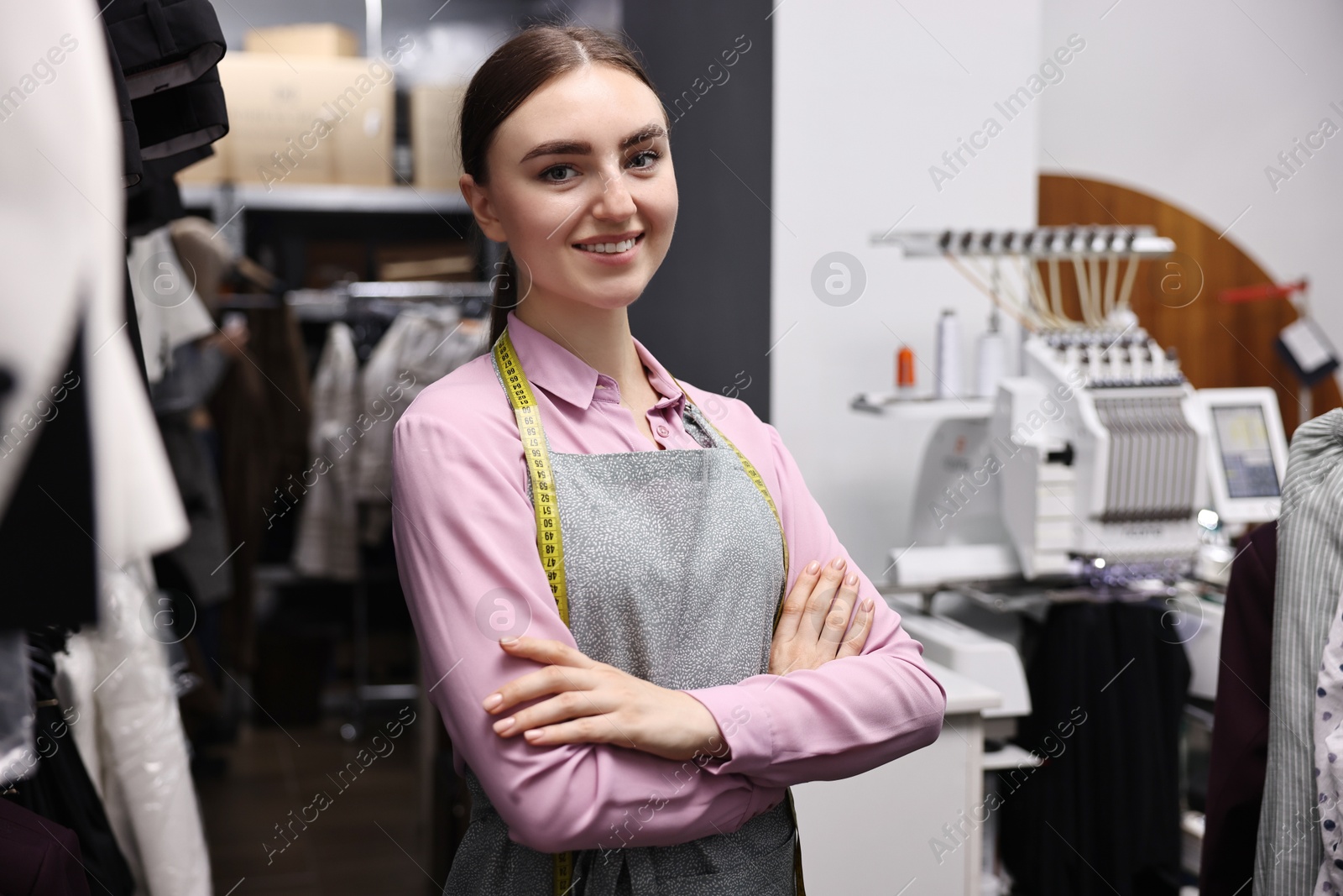 Photo of Atelier. Young woman working in professional workshop