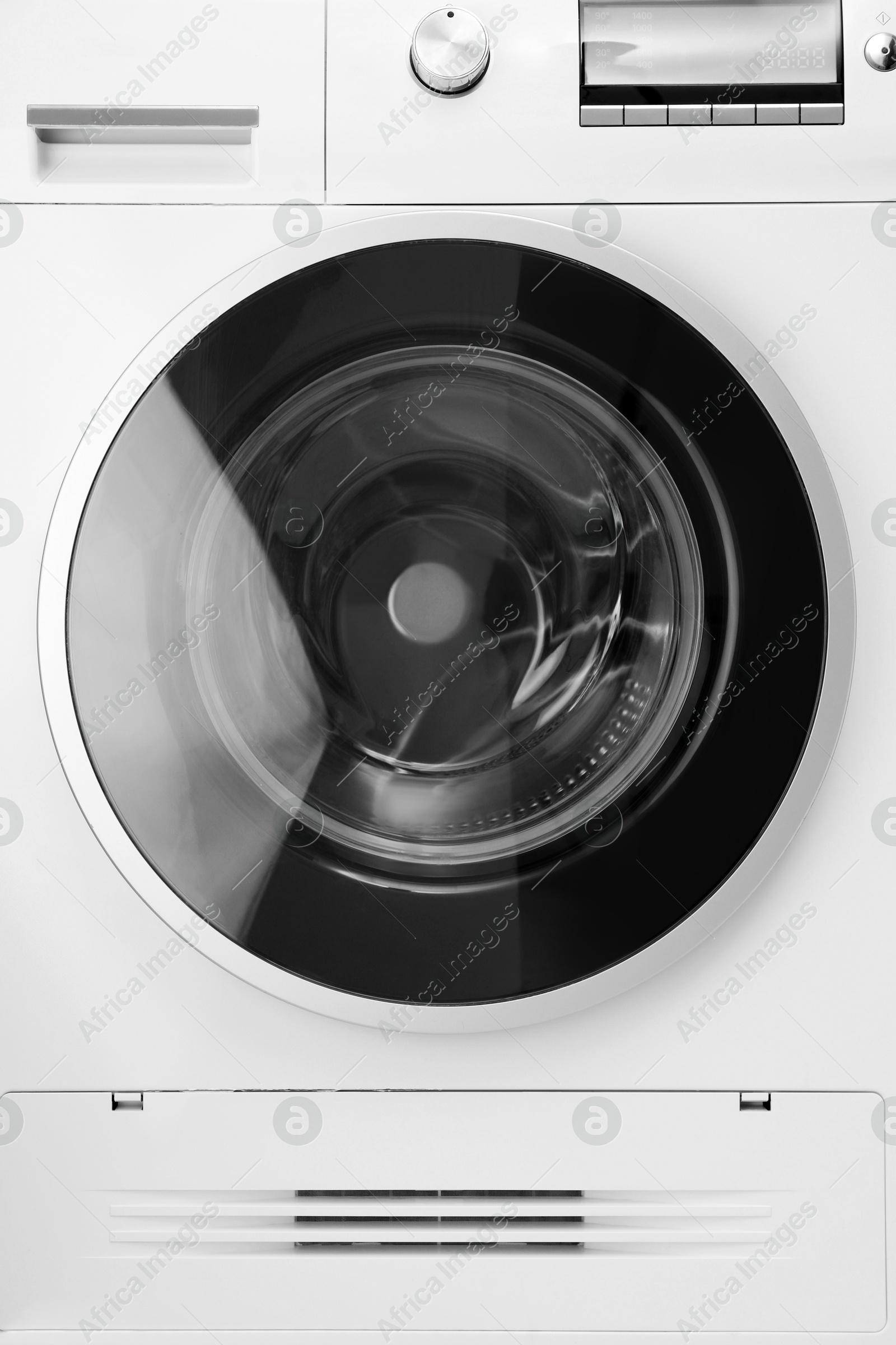 Photo of Washing machine with empty drum as background, closeup