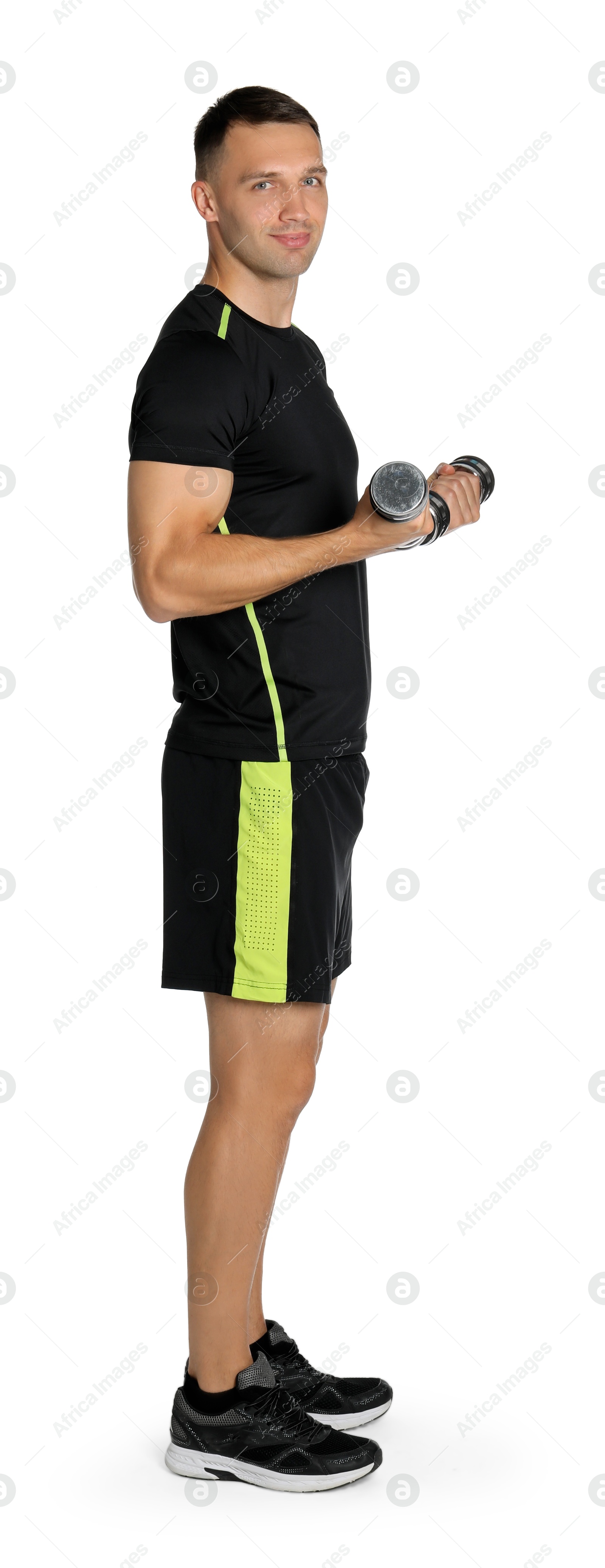 Photo of Man exercising with dumbbells on white background