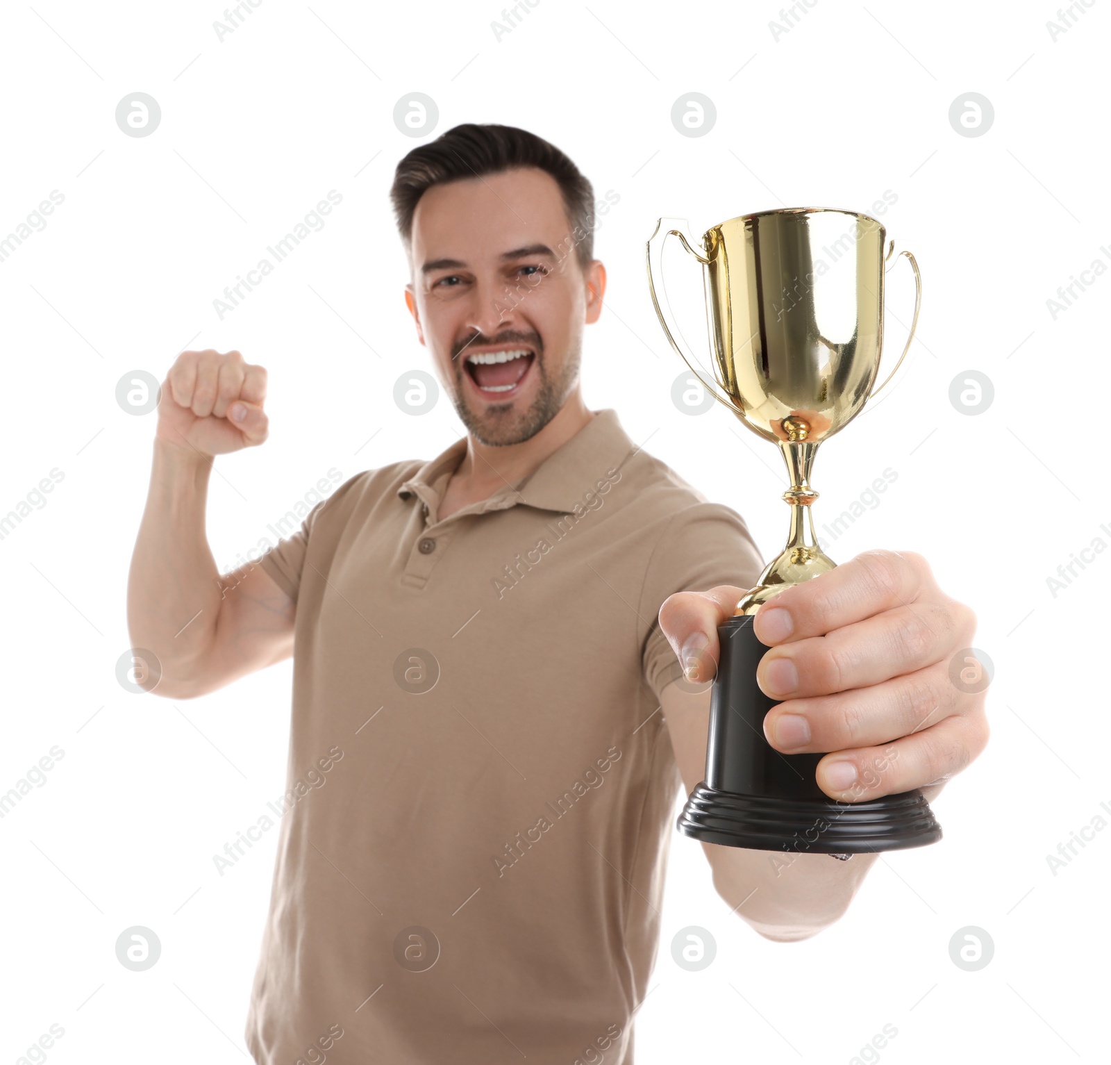 Photo of Happy winner with golden trophy cup on white background