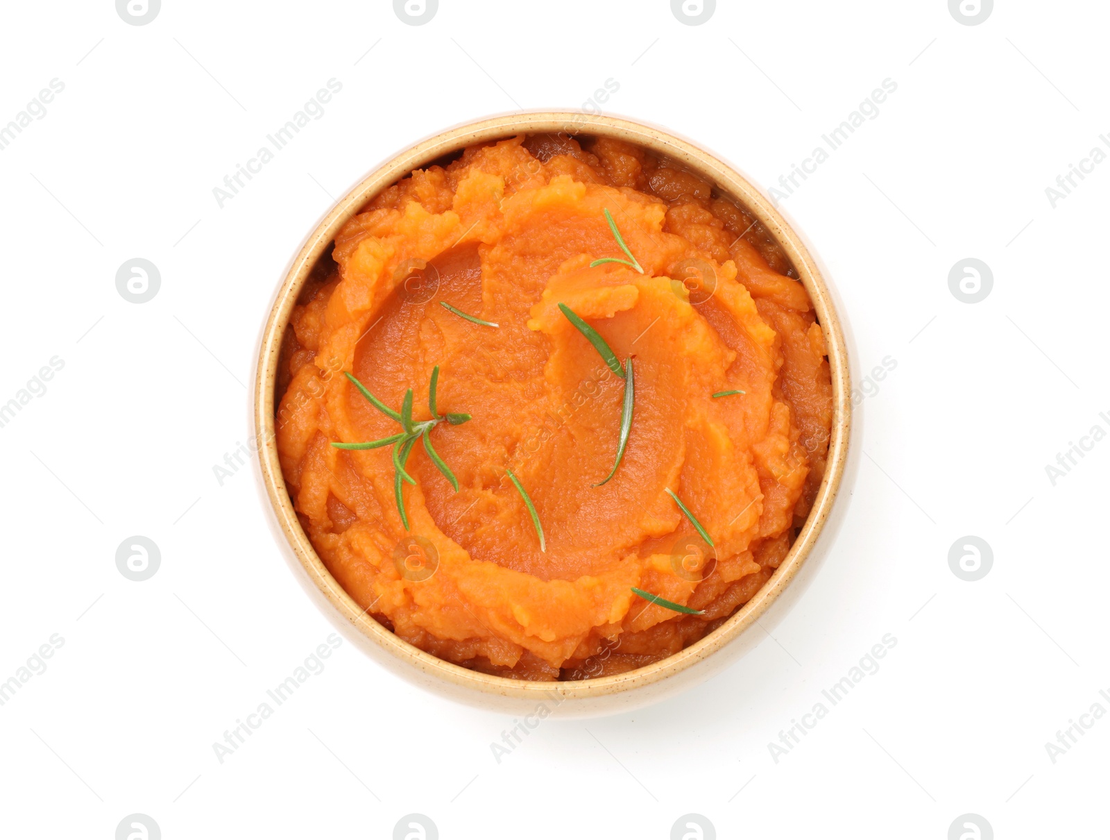 Photo of Tasty mashed sweet potato with rosemary in bowl isolated on white, top view