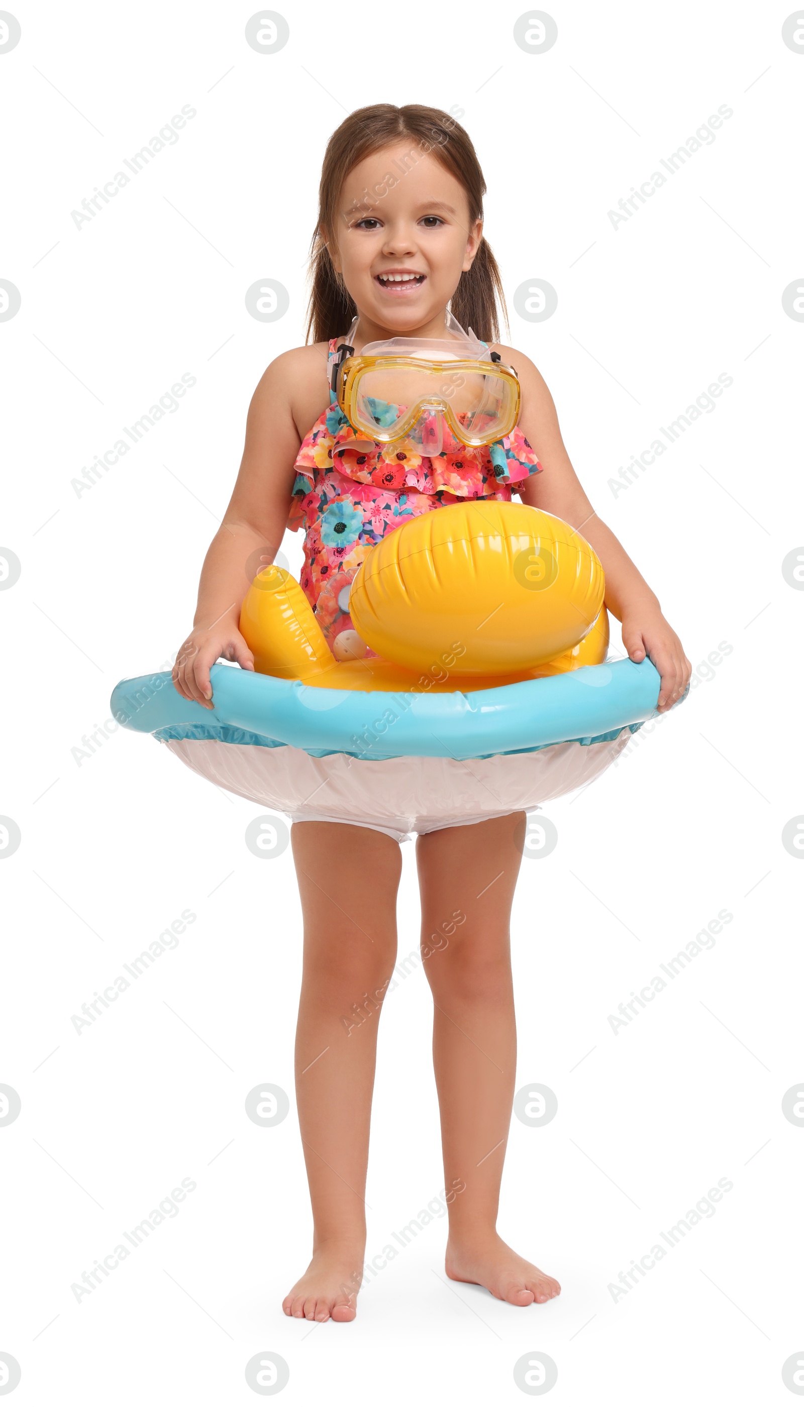 Photo of Cute little girl in swimsuit with inflatable ring on white background