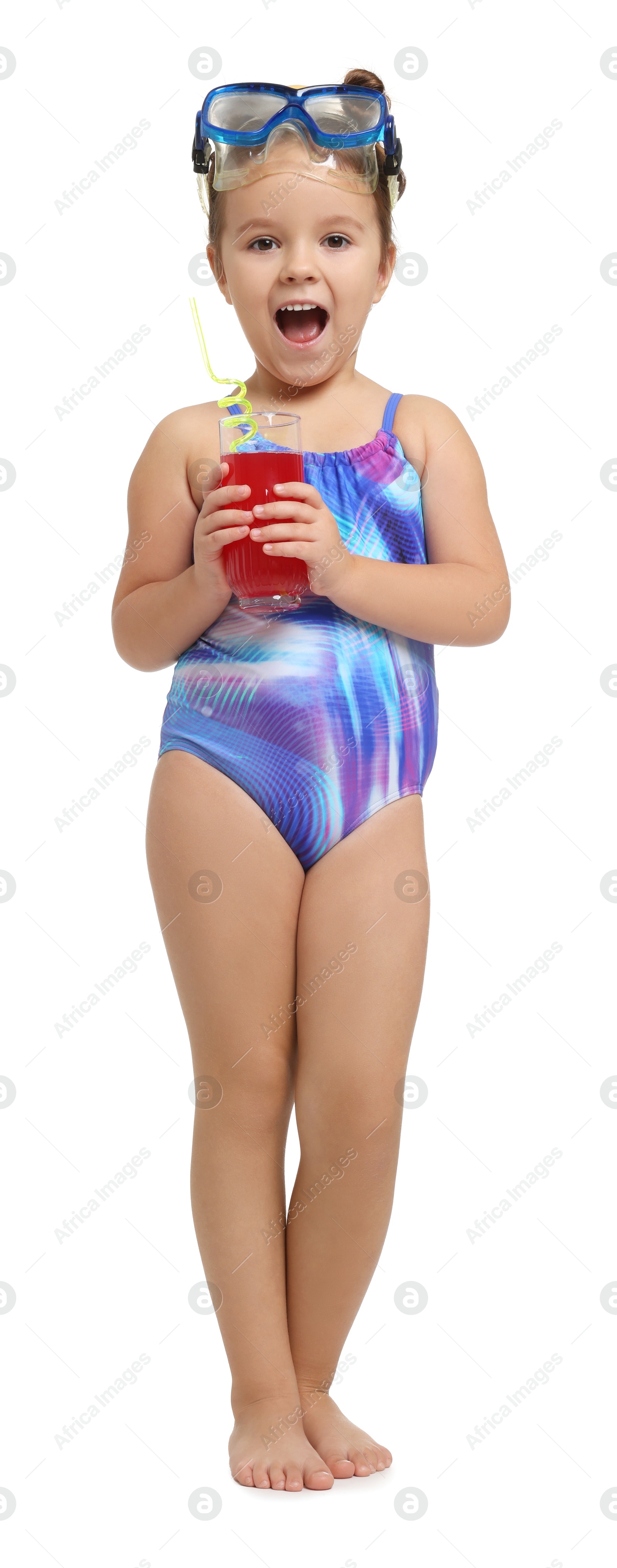 Photo of Cute little girl in swimsuit with drink on white background