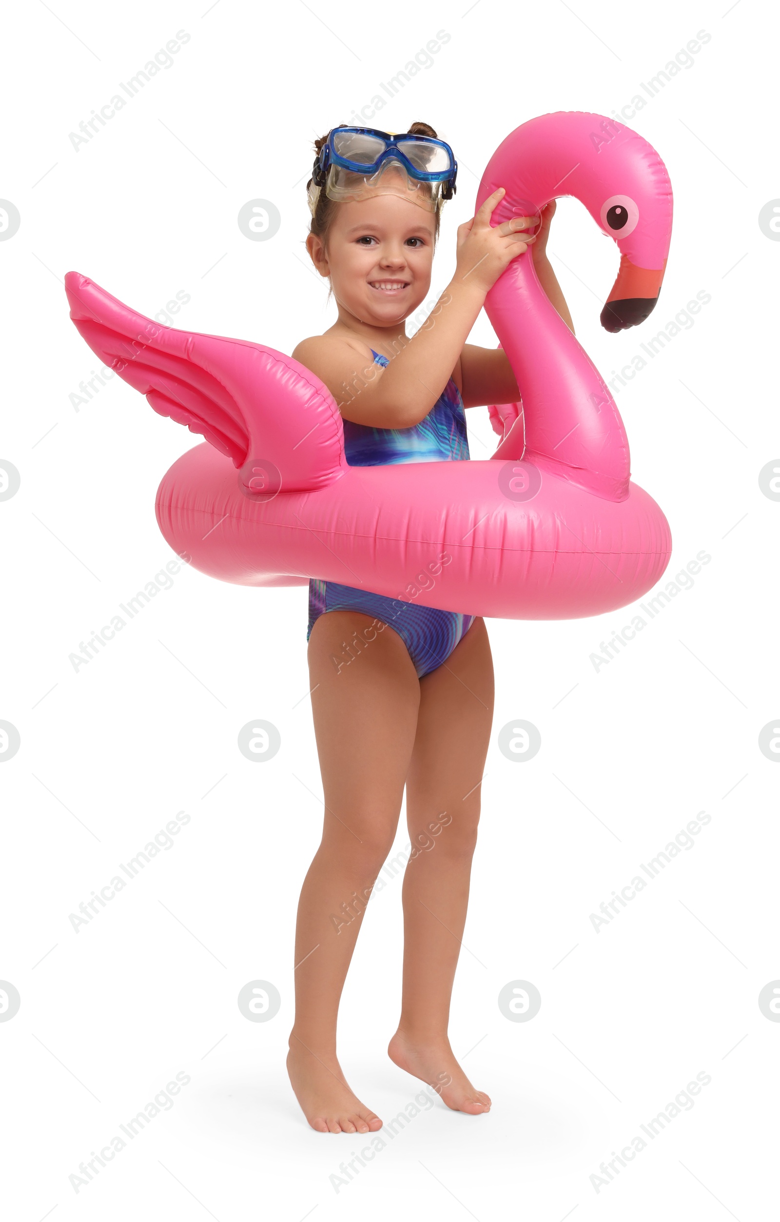 Photo of Cute little girl in swimsuit with inflatable ring on white background