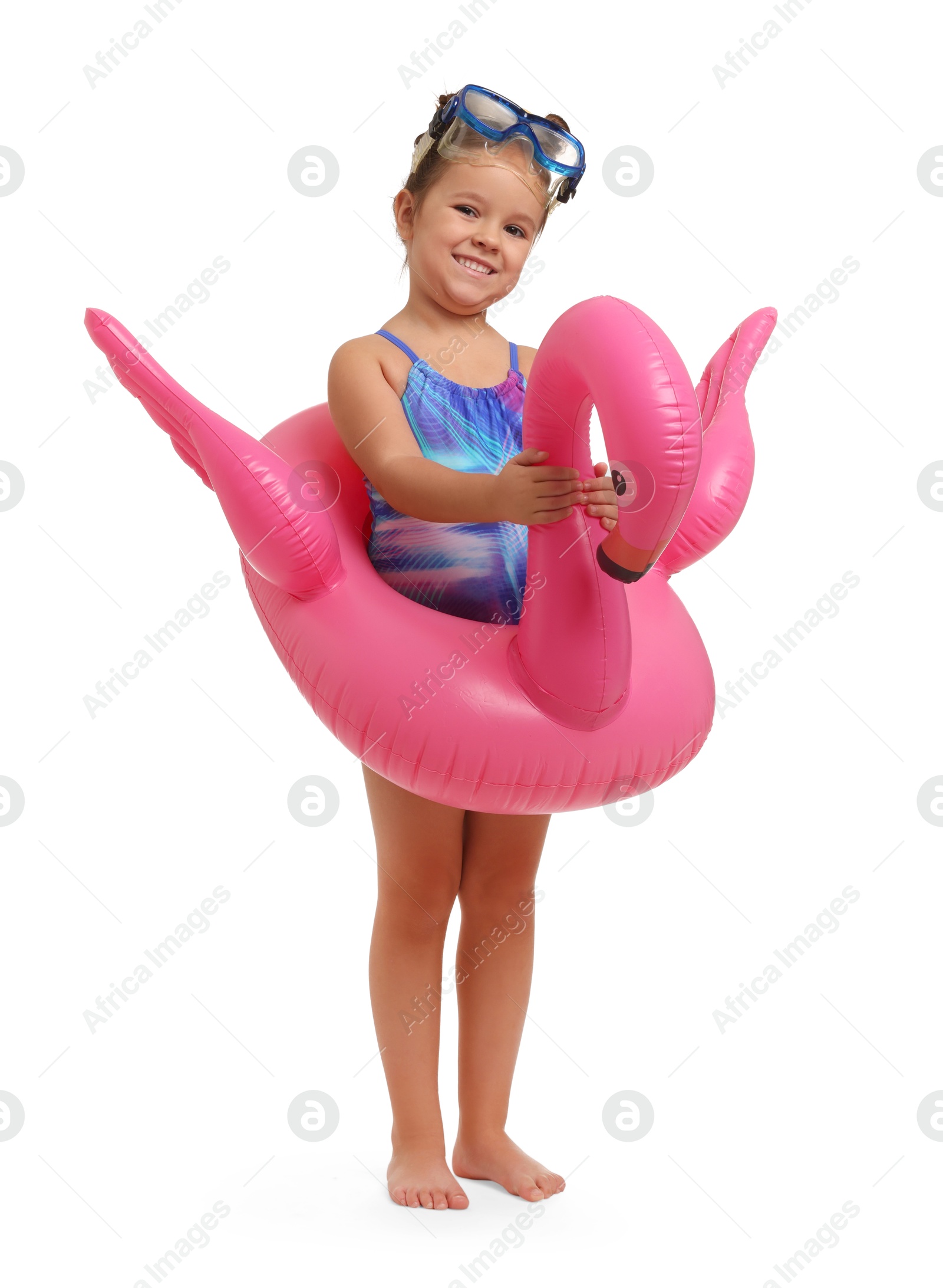 Photo of Cute little girl in swimsuit with inflatable ring on white background