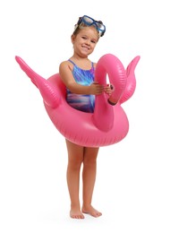 Cute little girl in swimsuit with inflatable ring on white background