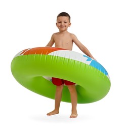 Photo of Cute little boy in beachwear with inflatable ring on white background