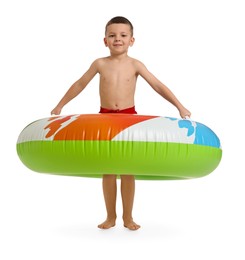 Photo of Cute little boy in beachwear with inflatable ring on white background