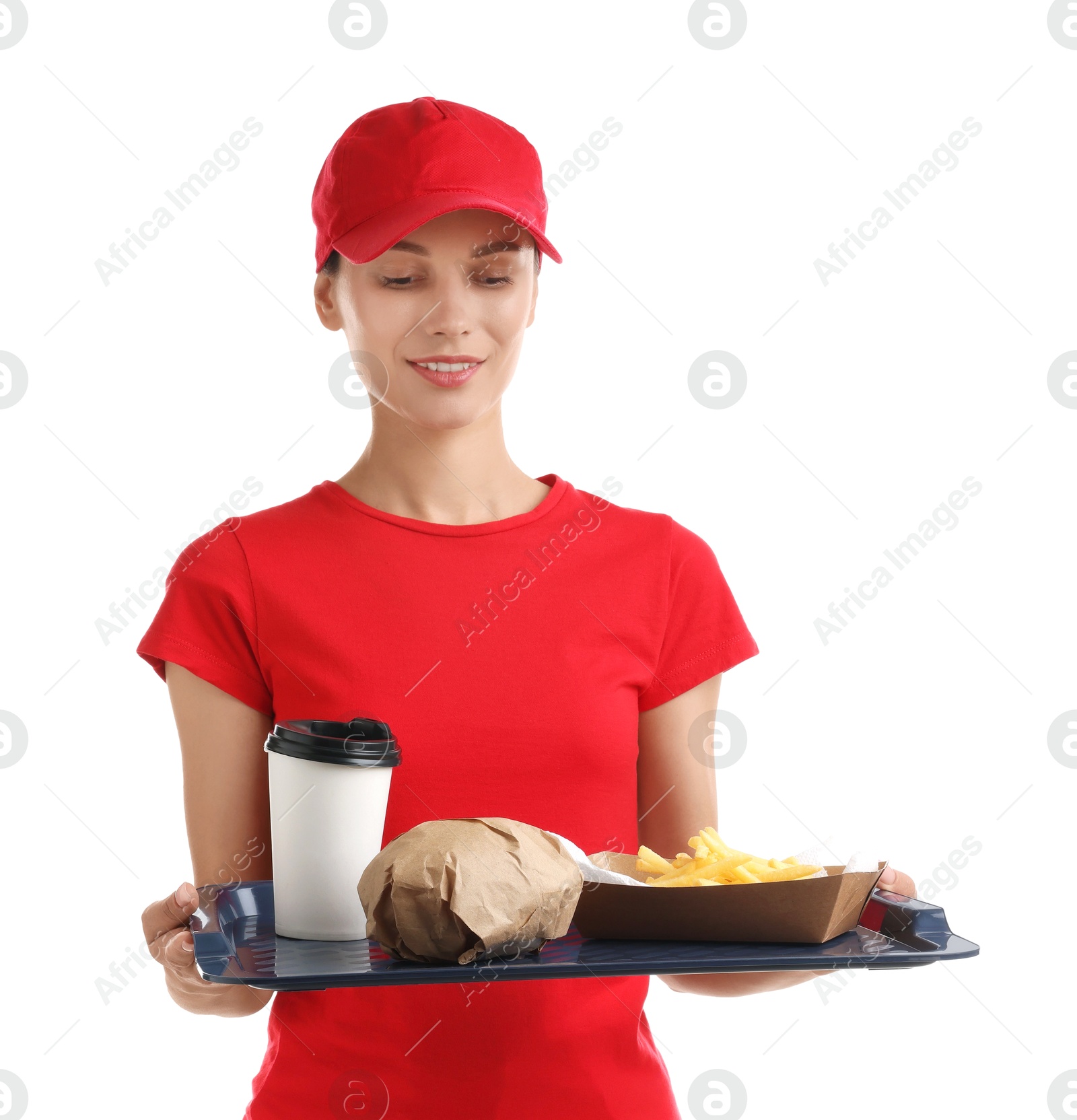 Photo of Fast-food worker holding tray with order on white background