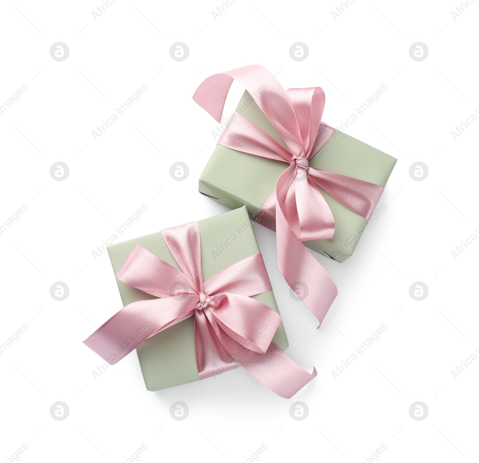 Photo of Beautiful gift boxes with pink bows isolated on white, top view