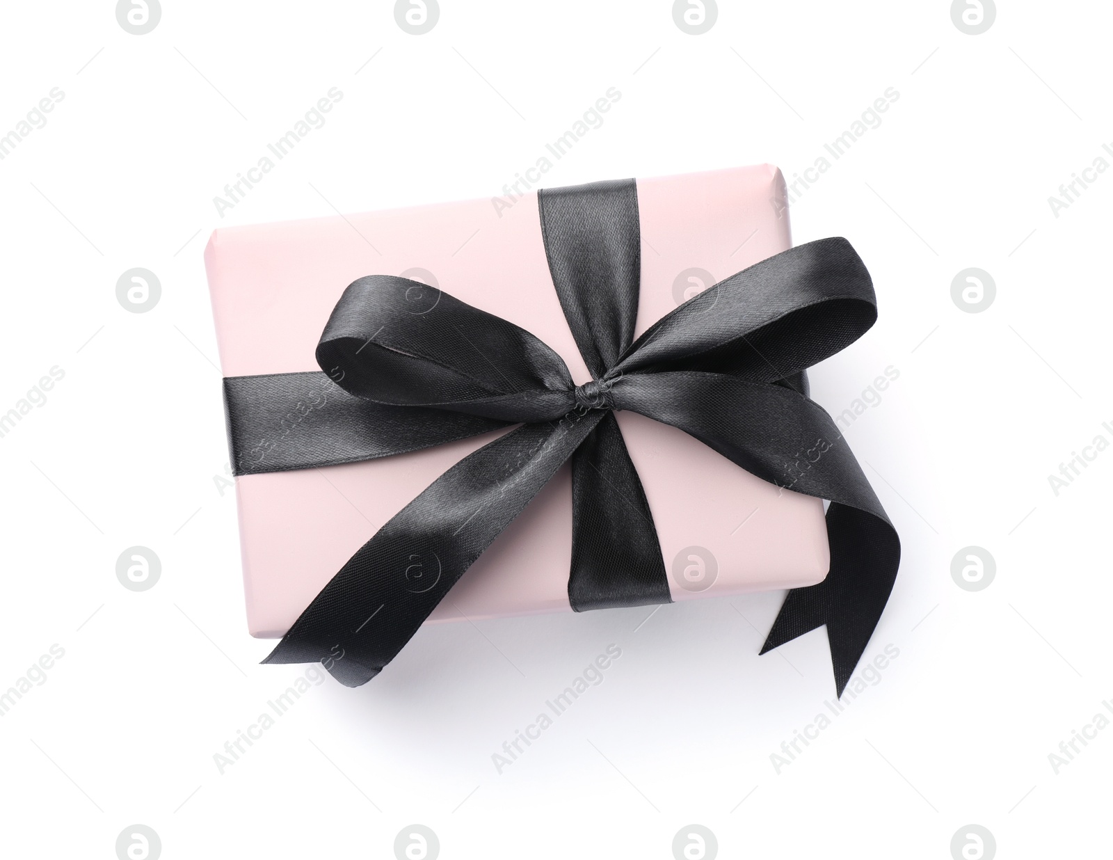 Photo of Beautiful gift box with black bow isolated on white, top view