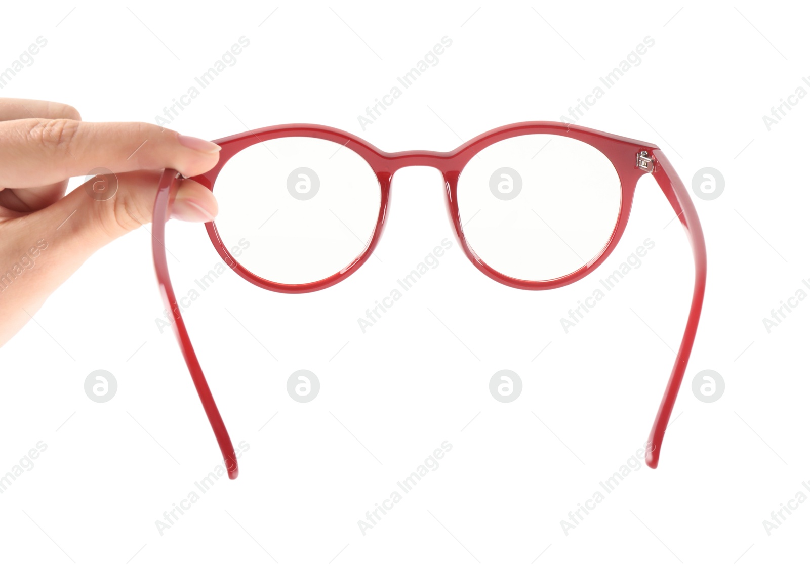 Photo of Woman holding glasses with red frame on white background, closeup