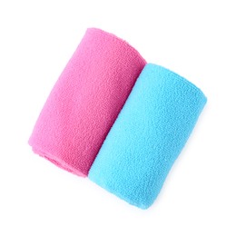 Photo of Clean pink and light blue microfiber cloths isolated on white, top view