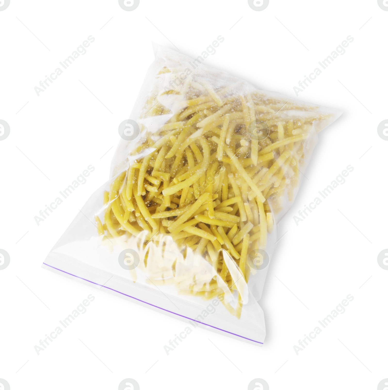 Photo of Frozen yellow beans in plastic bag isolated on white, top view