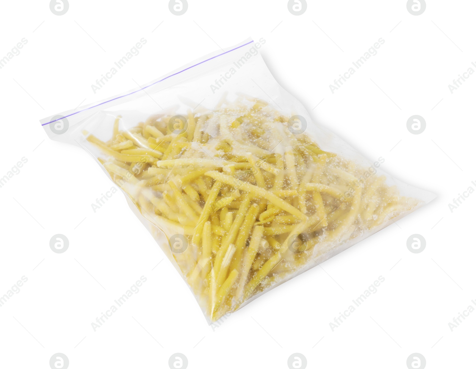 Photo of Frozen yellow beans in plastic bag isolated on white