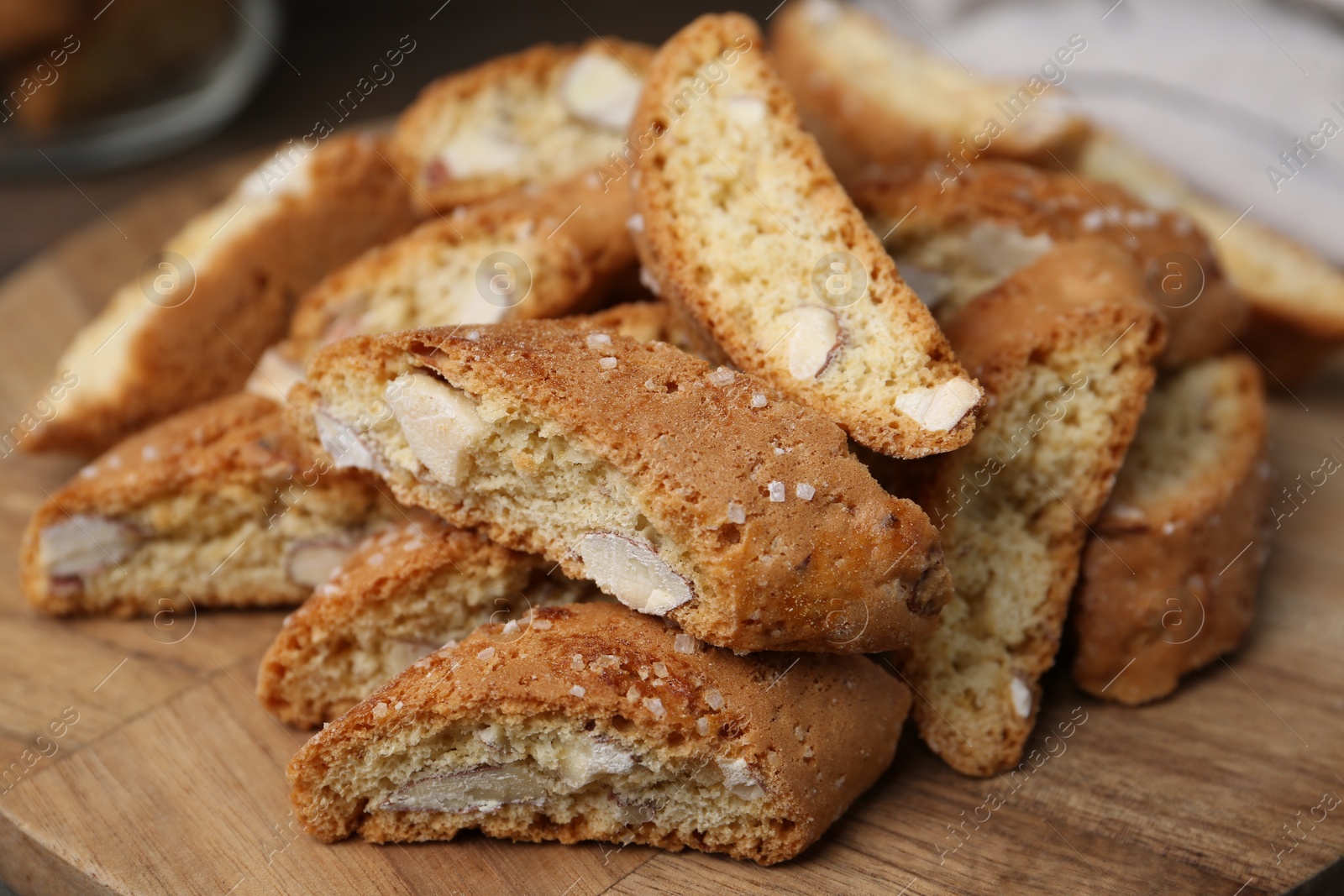 Photo of Traditional Italian almond biscuits (Cantucci) on table, closeup