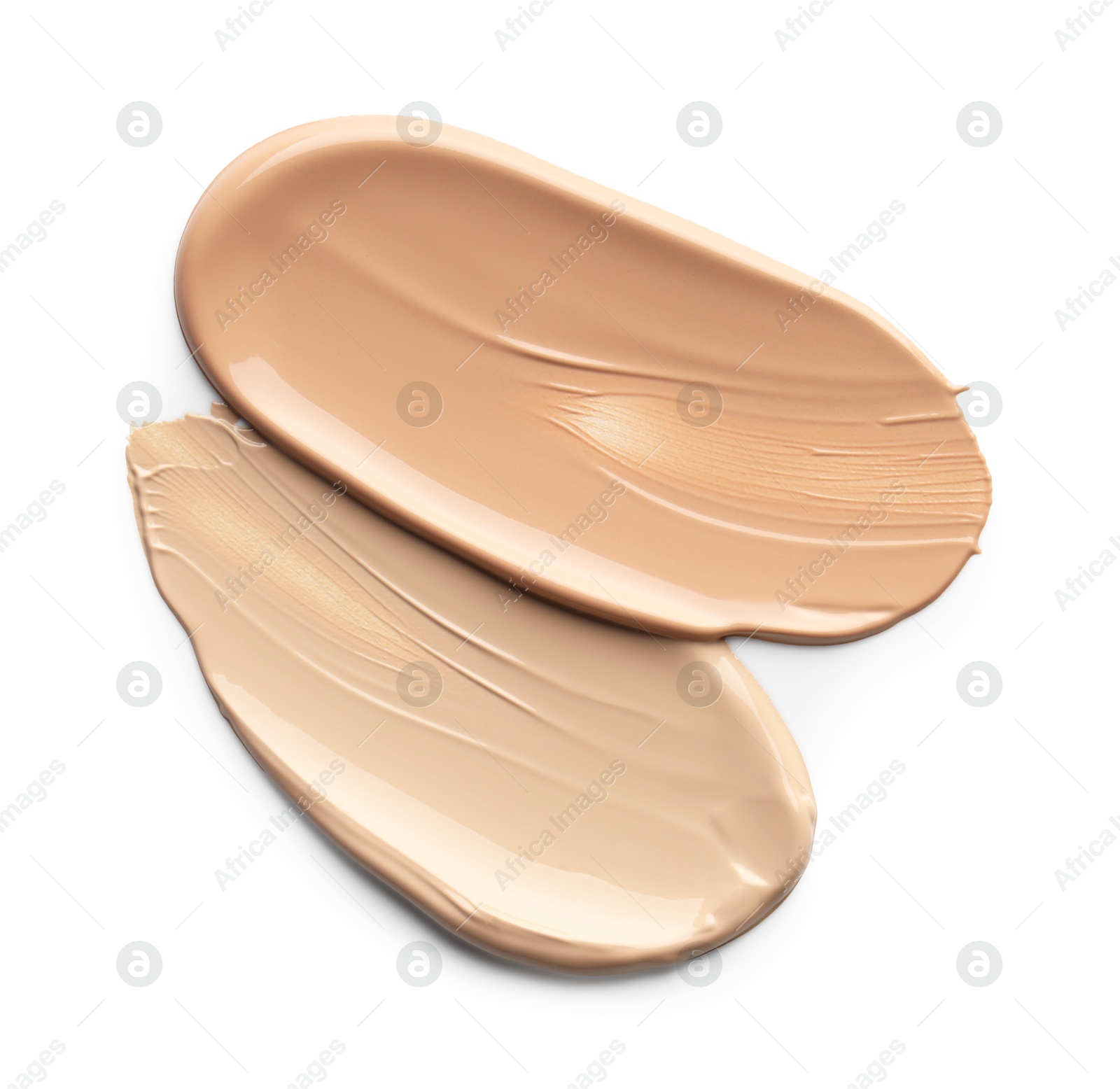 Photo of Skin foundation isolated on white, top view. Samples of cosmetic product