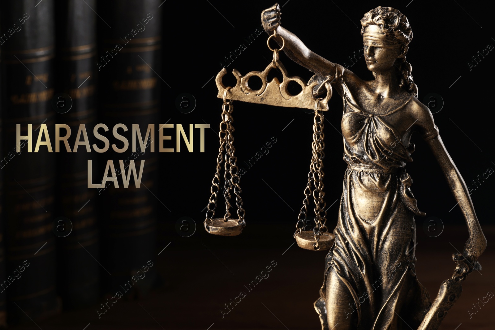 Image of Harassment law. Statue of Lady Justice and books on dark background