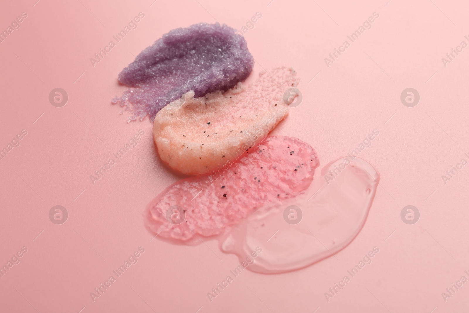 Photo of Samples of cosmetic products on pink background. Skin care