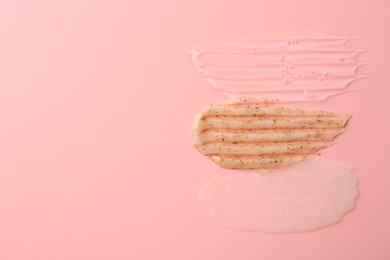 Photo of Samples of cosmetic products on pink background, top view. Space for text. Skin care