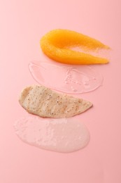 Photo of Samples of cosmetic products on pink background. Skin care