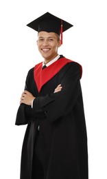 Photo of Happy student with crossed arms after graduation on white background