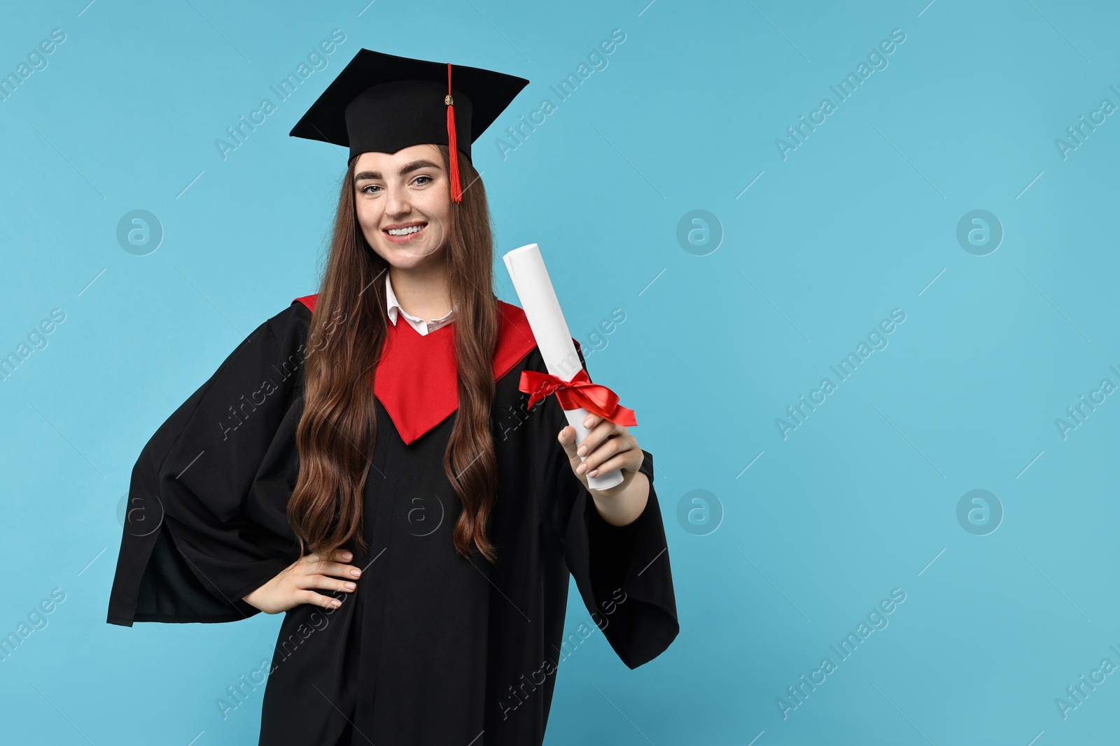 Photo of Happy student with diploma after graduation on light blue background. Space for text