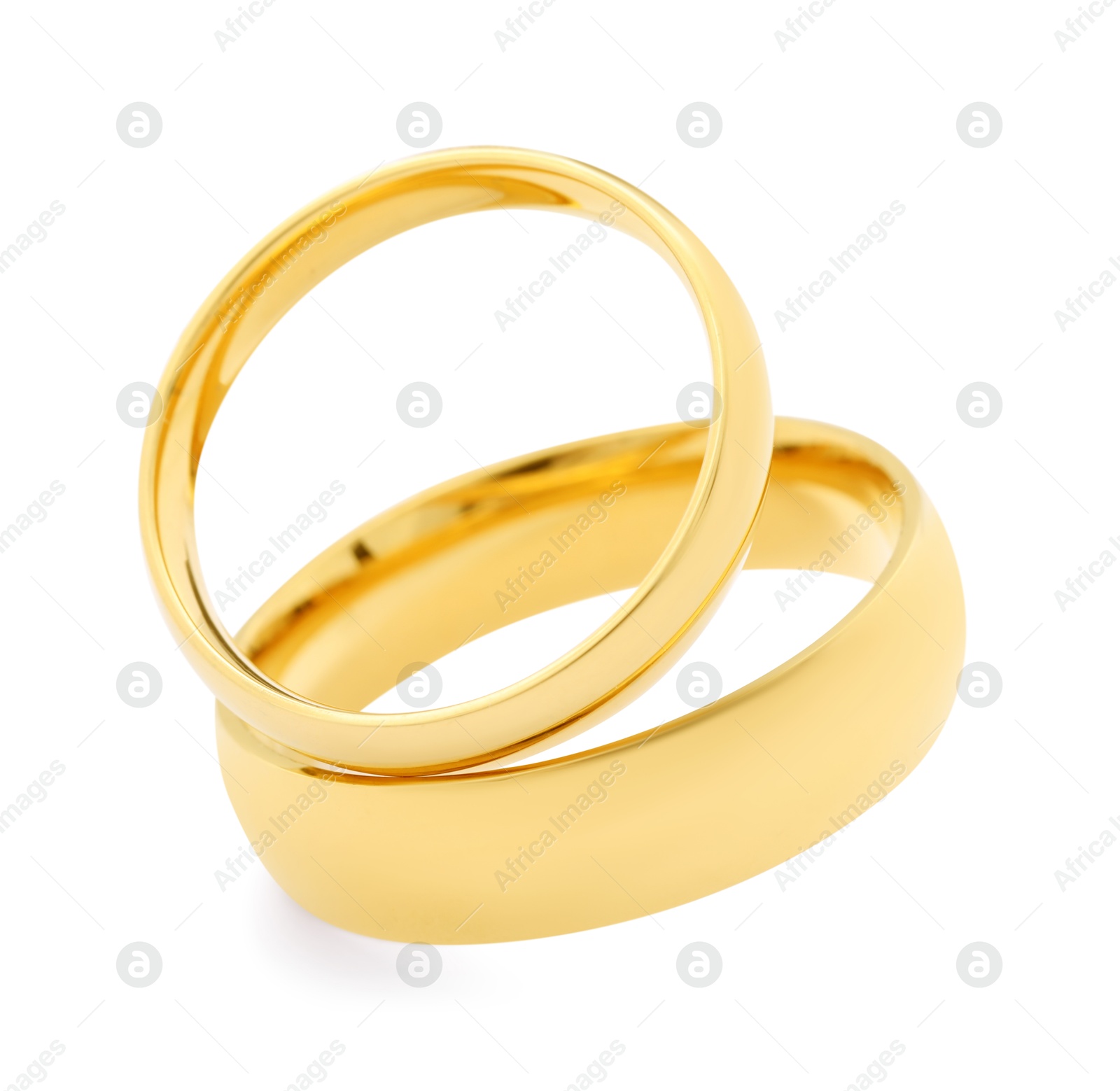 Photo of Beautiful golden wedding rings isolated on white